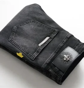 Jeansy z logo krzyża Chrome Hearts