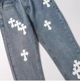 Jeansy z naszywką w kształcie krzyża Chrome Hearts Cross Patch